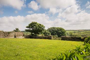 The large garden with space to play ball games, do cartwheels or just relax around the fire-pit (shared with Burnfoot (2006) next door).