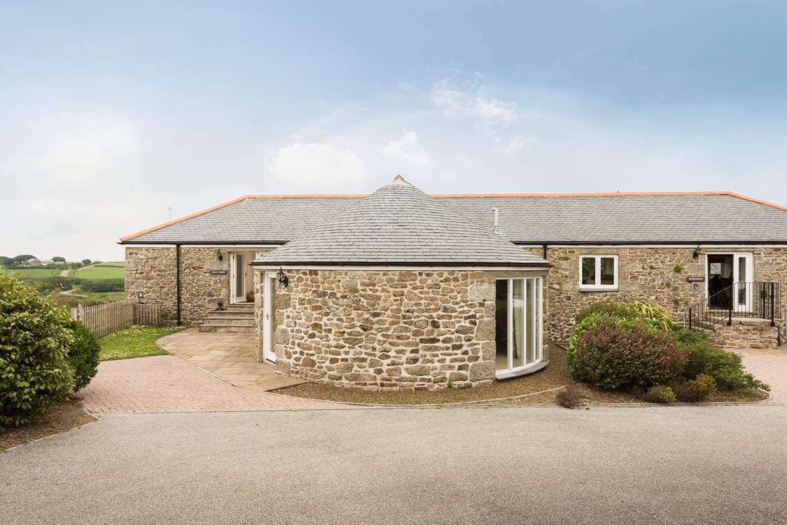 The entrance to Gilly Barn is on the left of the photograph.