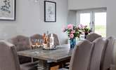 The gorgeous dining room overlooks the gardens and fields beyond.  - Thumbnail Image