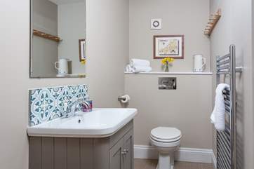 The lovely cloakroom is very handy and is located on the first floor.