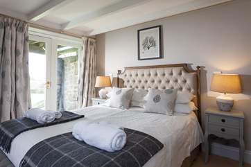 This is another view of the main bedroom. The door opens onto the rear courtyard.