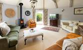 The beautiful sitting room is a lovely space to relax any time of day.  - Thumbnail Image