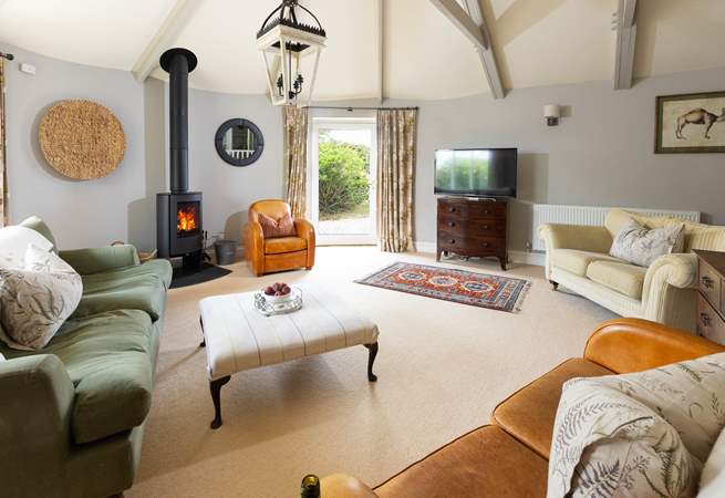 The beautiful sitting room is a lovely space to relax any time of day. 