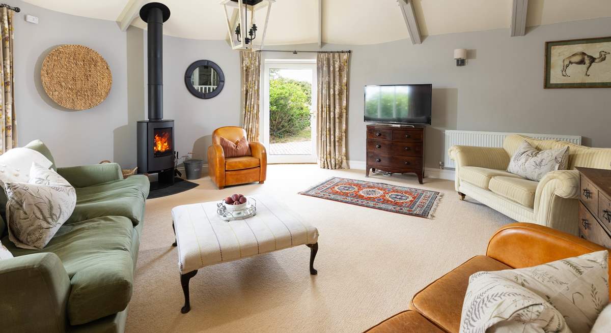 The beautiful sitting room is a lovely space to relax any time of day. 