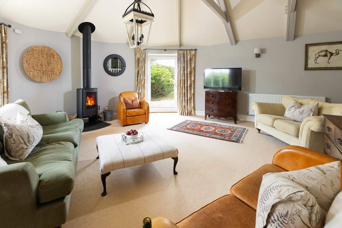 The beautiful sitting room is a lovely space to relax any time of day.