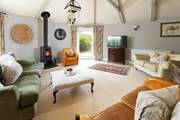 The beautiful sitting room is a lovely space to relax any time of day.