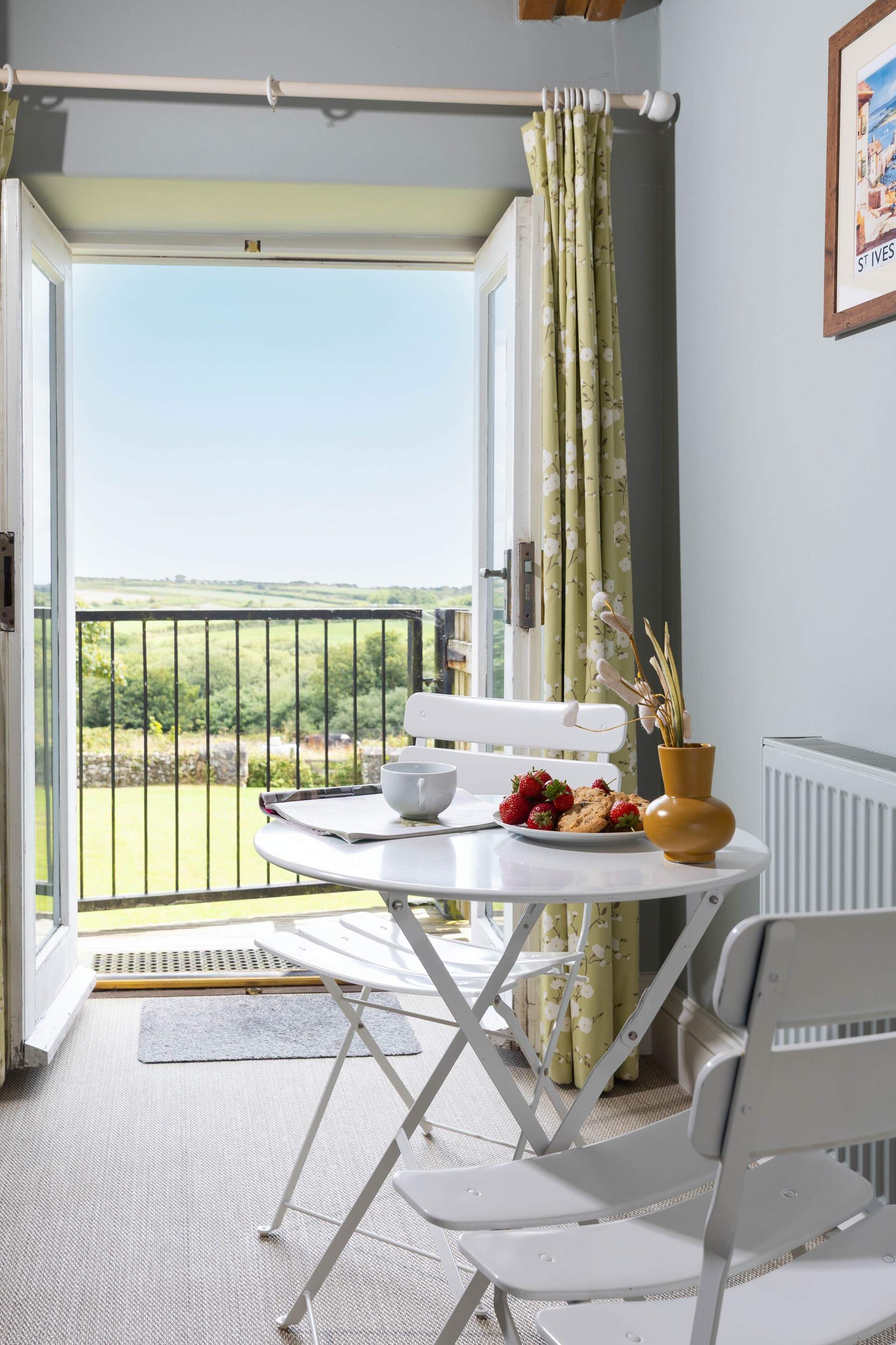 There is a cosy breakfast table for two. 