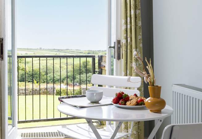 There is a cosy breakfast table for two. 