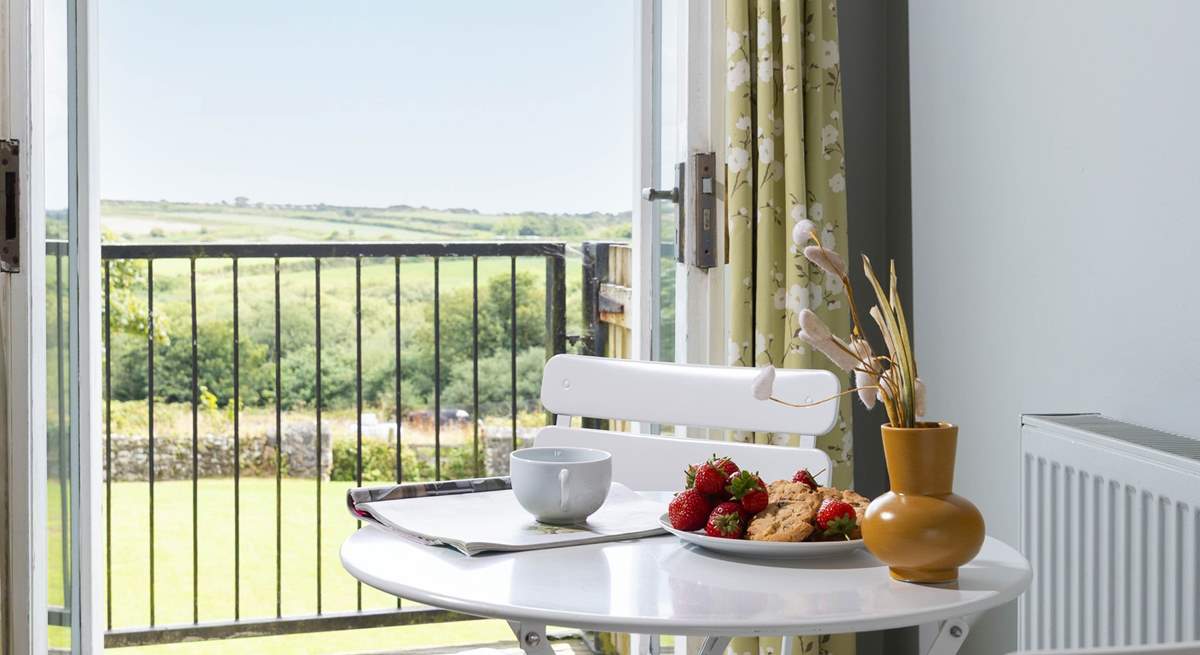 There is a cosy breakfast table for two. 