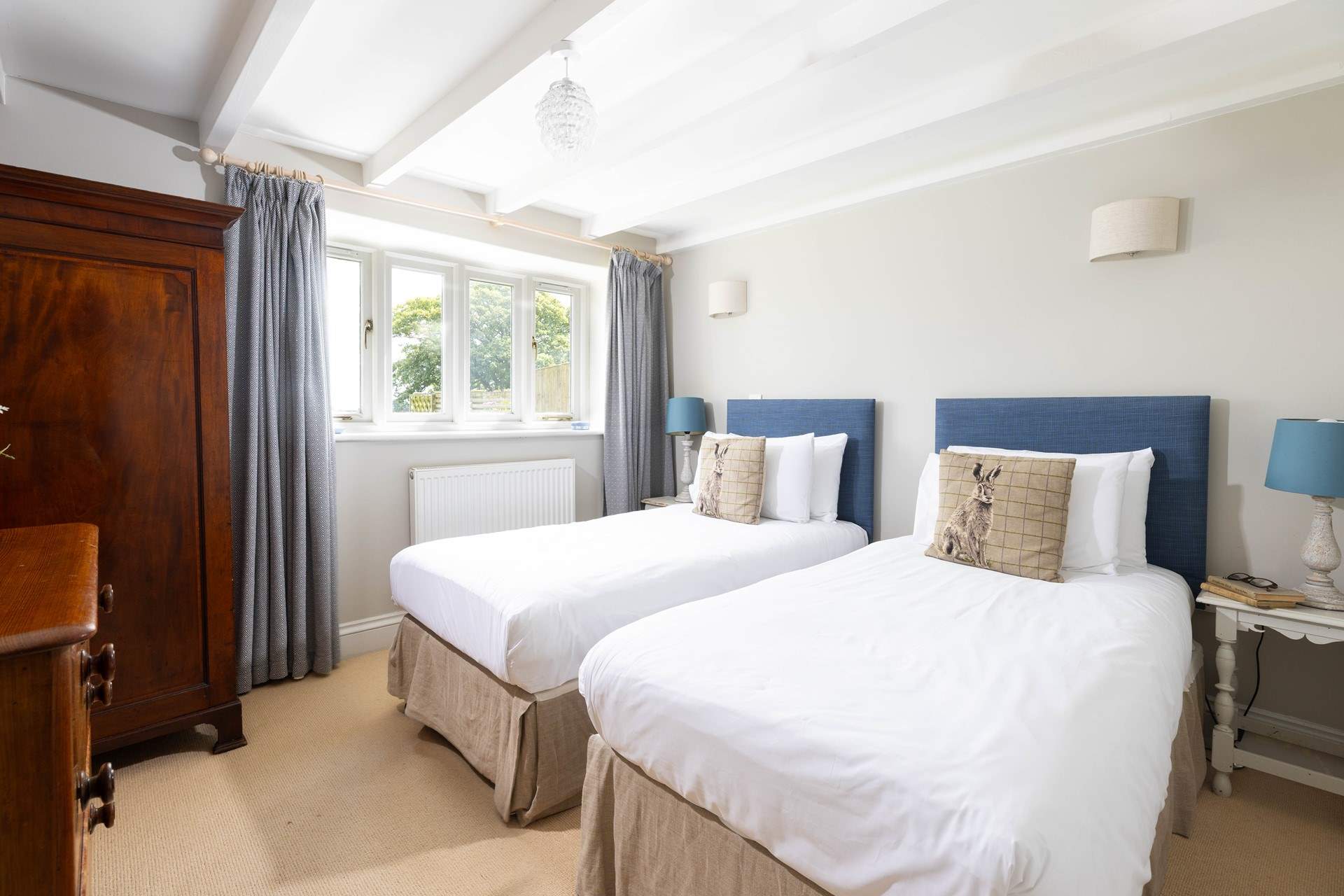 This bedroom has zip and link beds so suit families or groups of friends. 