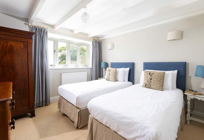 This bedroom has zip and link beds so suit families or groups of friends. 