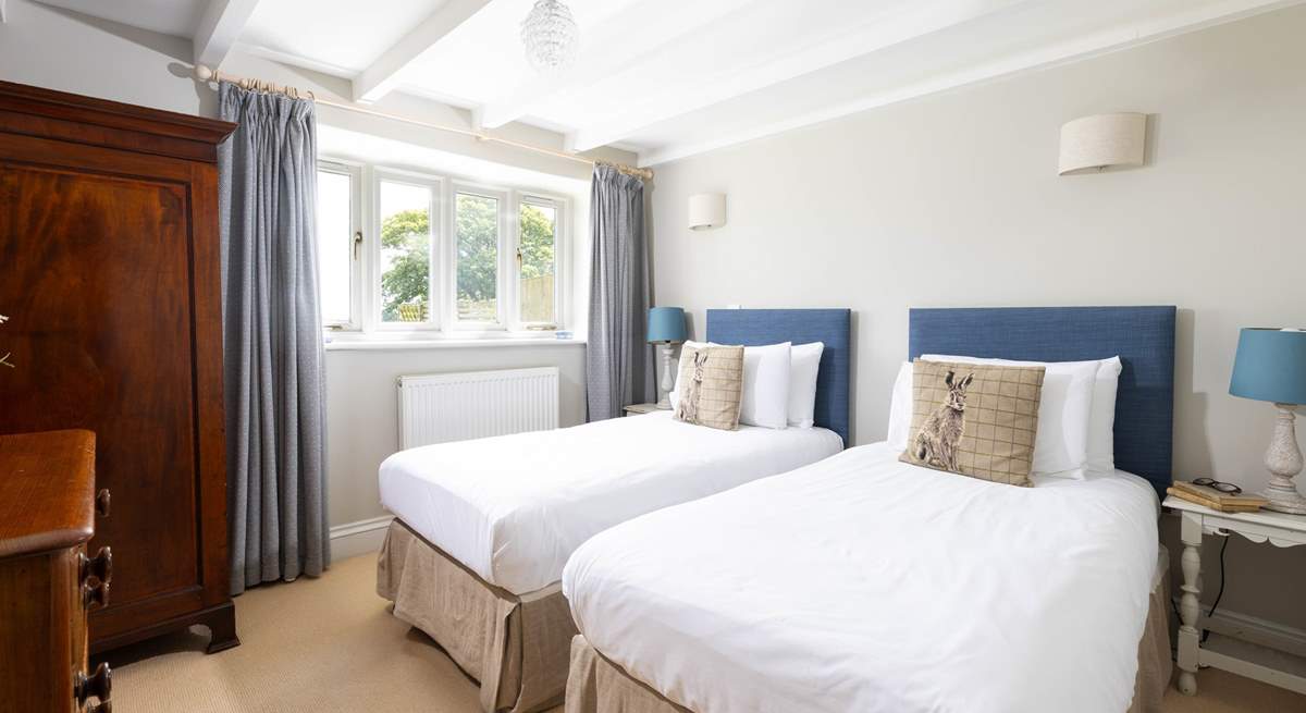 This bedroom has zip and link beds so suit families or groups of friends. 