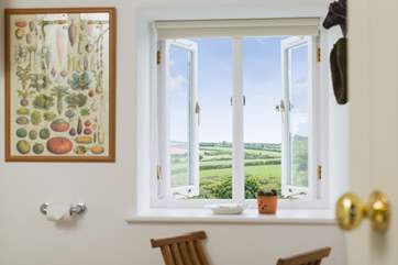 These lovely barns are surrounded by countryside.