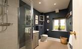 The stylish shower-room is located between the living room and kitchen on the upper floor. - Thumbnail Image