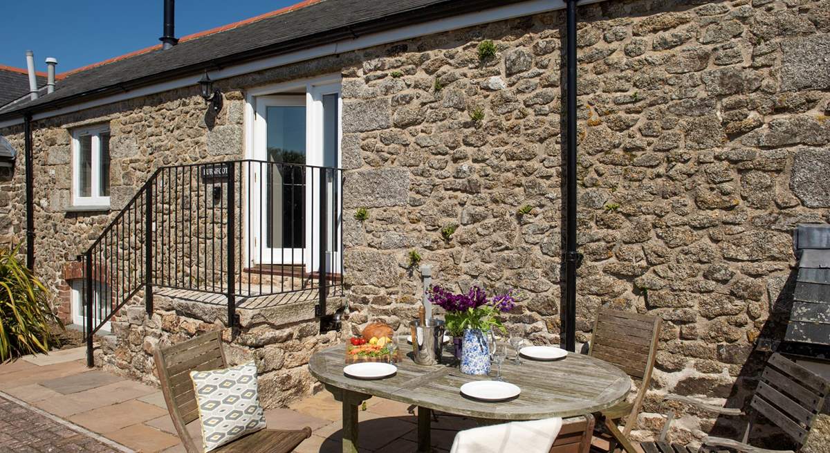 A sunny spot on the terrace to the front of the barn.