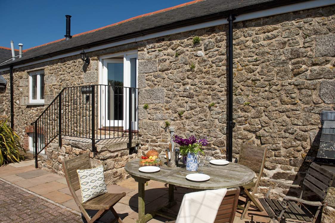 A sunny spot on the terrace to the front of the barn.