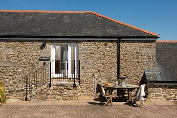 Five stone steps take you up to the front door, one step more and welcome to your holiday home.