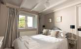 The calm and relaxing second double bedroom looks out over the garden. - Thumbnail Image