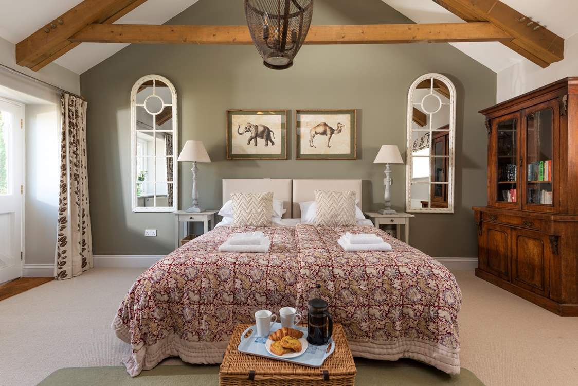 The third double at the end of the barn is furnished with versatile 'zip and link' (double or twin) beds, another fabulous and big bedroom.