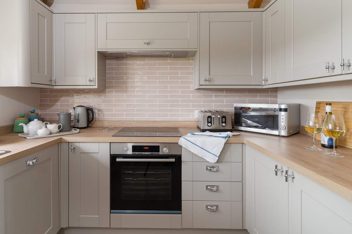 Cook up a feast in the lovely kitchen.