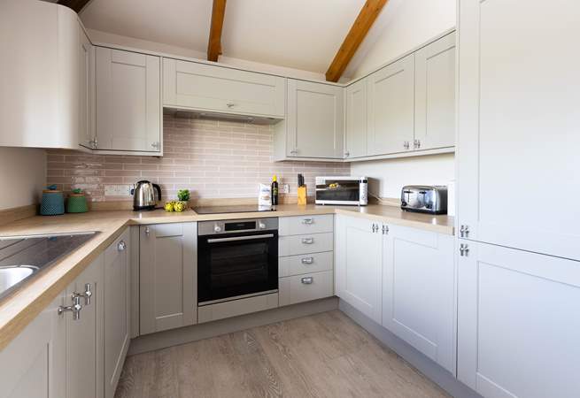 The modern kitchen has everything you might need. 