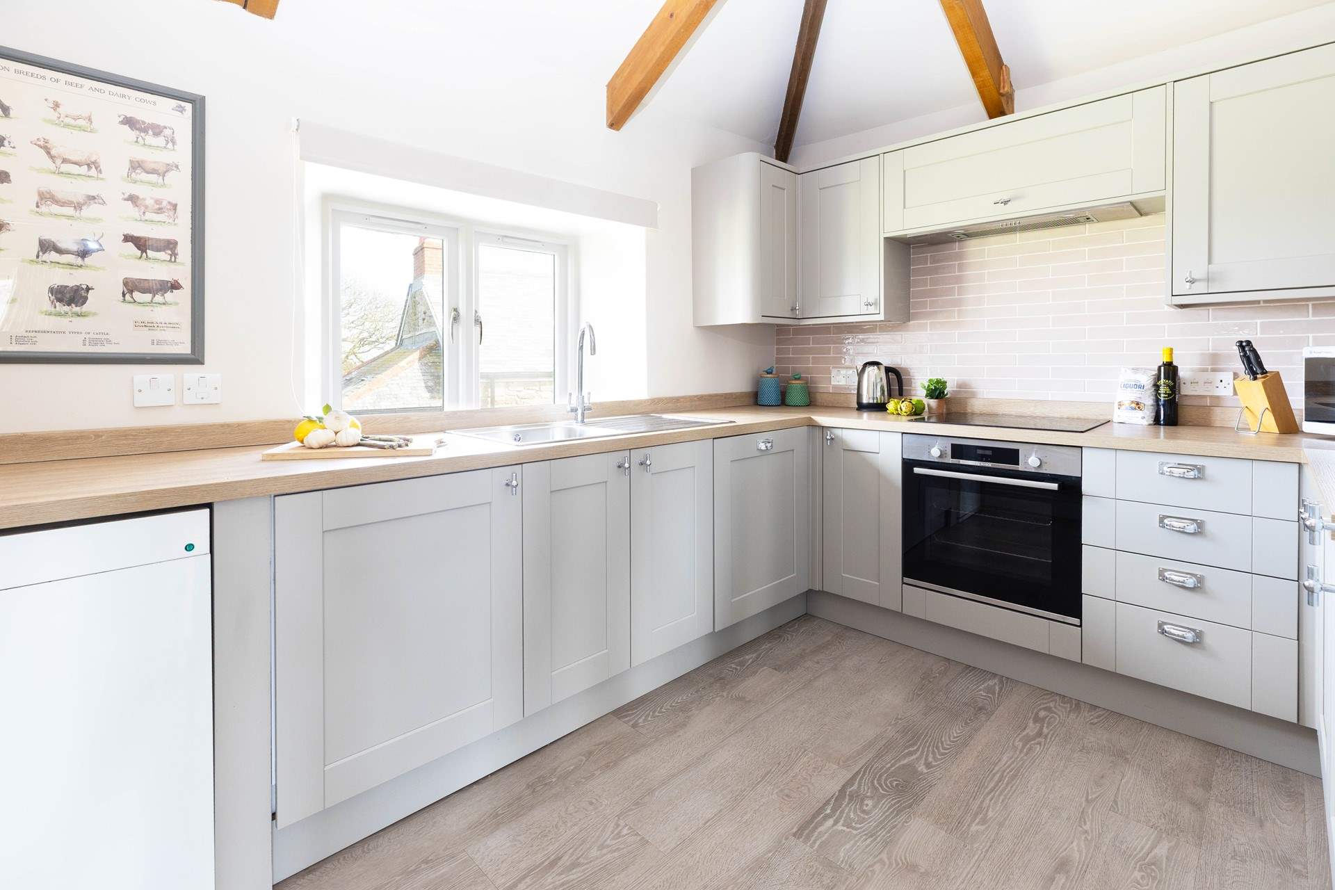 The well equipped kitchen has far reaching countryside views. 