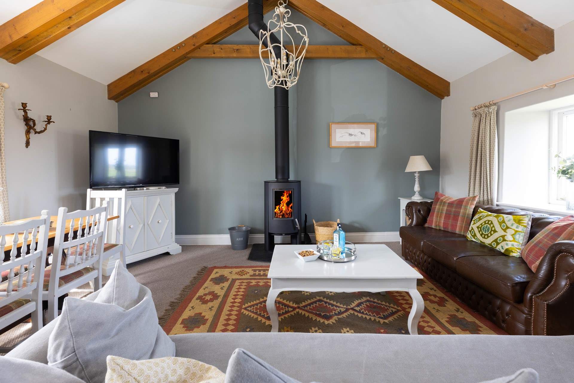 Snuggle up in front of the wood burner. 