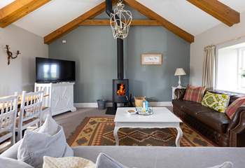 Snuggle up in front of the wood burner. 