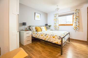The master bedroom has a king size bed (Bedroom 1).