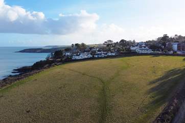 Opies Toy is in the wooden clad building in the far right corner of this image - look how close you are to the sea and the coast path.