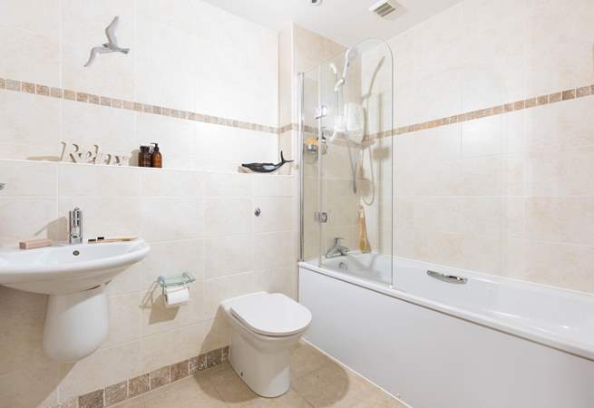 Enjoy a long bubble bath in the family bathroom. 