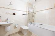 Enjoy a long bubble bath in the family bathroom.
