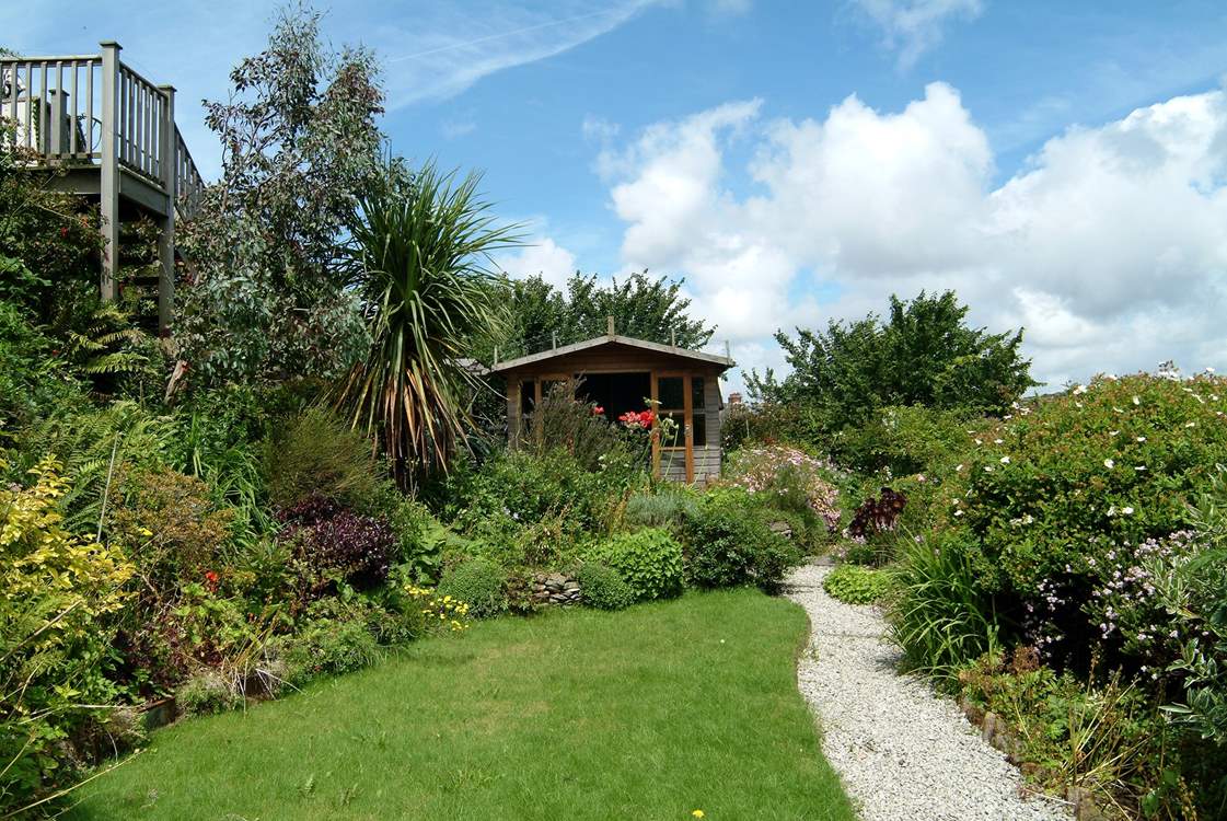 The garden on the first level below the property.