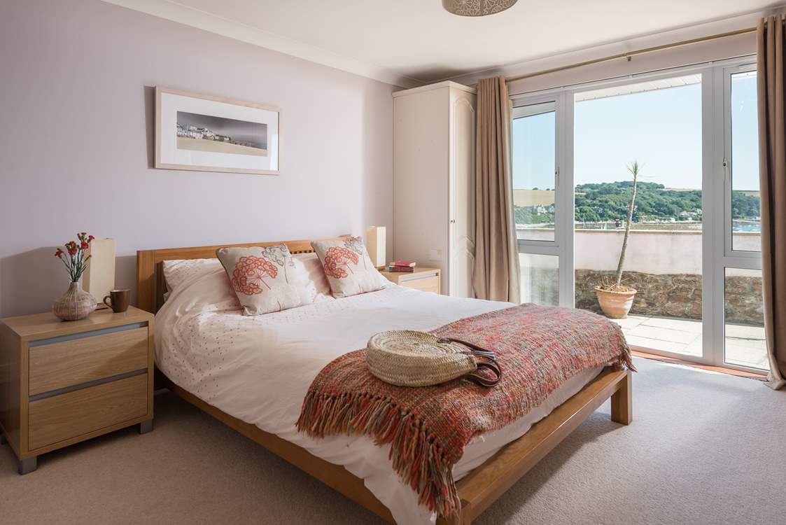 The master bedroom has double doors to the terrace.