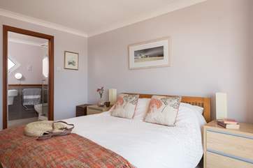 The master bedroom has an en suite bathroom.