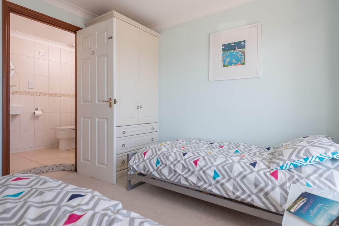 The twin bedroom has an en suite shower-room.