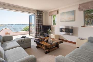 Open up the bi-fold doors to bring the outside in.