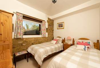 This is the twin bedroom which looks out over the courtyard towards the garden.