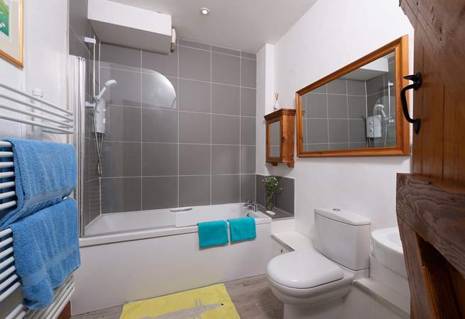 There is a new bathroom here too. A lovely fresh design to balance with the traditional style of the cottage.