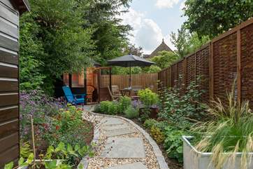 There is a beautiful garden for you to relax in.