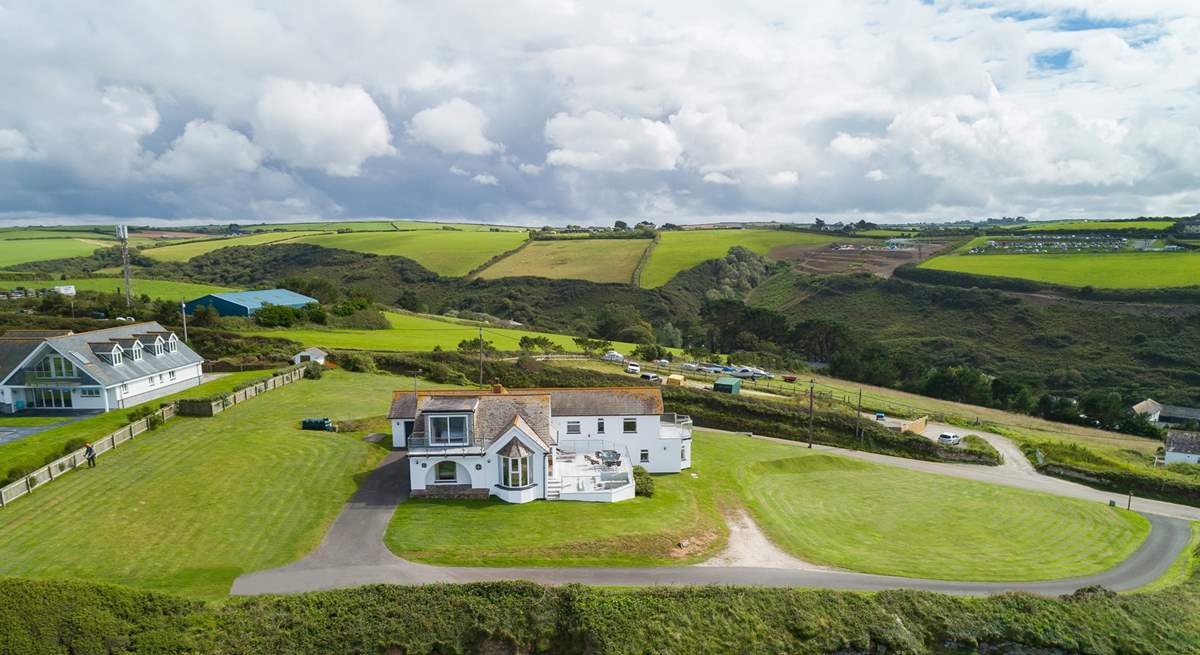 Silver Spray is surrounded by large lawned areas. The countryside behind the house is as stunning as the sea views.