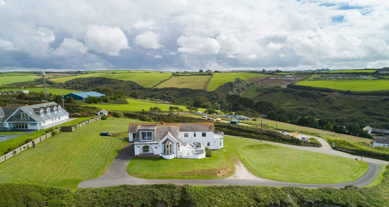 Silver Spray is surrounded by large lawned areas. The countryside behind the house is as stunning as the sea views.