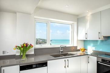 Should you get tied to the kitchen sink it won't be a chore, not with that view!