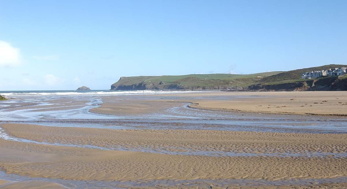 The beach at Polzeath is fabulous and popular with surfers and families alike.