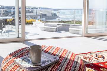 Patio doors lead out from the sitting-room to the large terrace, just look at that view!