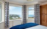 The lower ground floor bedroom also boasts spectacular sea views. - Thumbnail Image