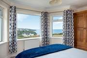 The lower ground floor bedroom also boasts spectacular sea views.