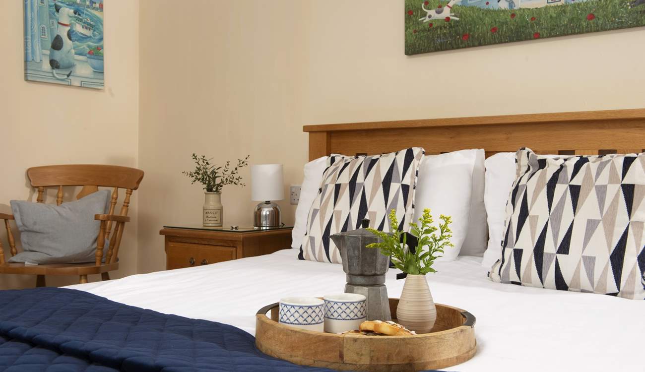 Enjoy a cup of coffee in bed while looking out at the stunning views.