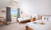 The modern first floor twin bedroom, with views of Port Isaac. - Thumbnail Image