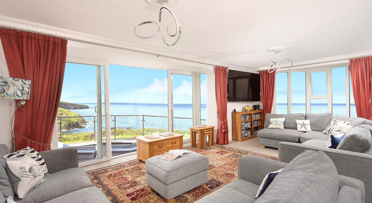 The large spacious sitting-room takes full advantage of the view.